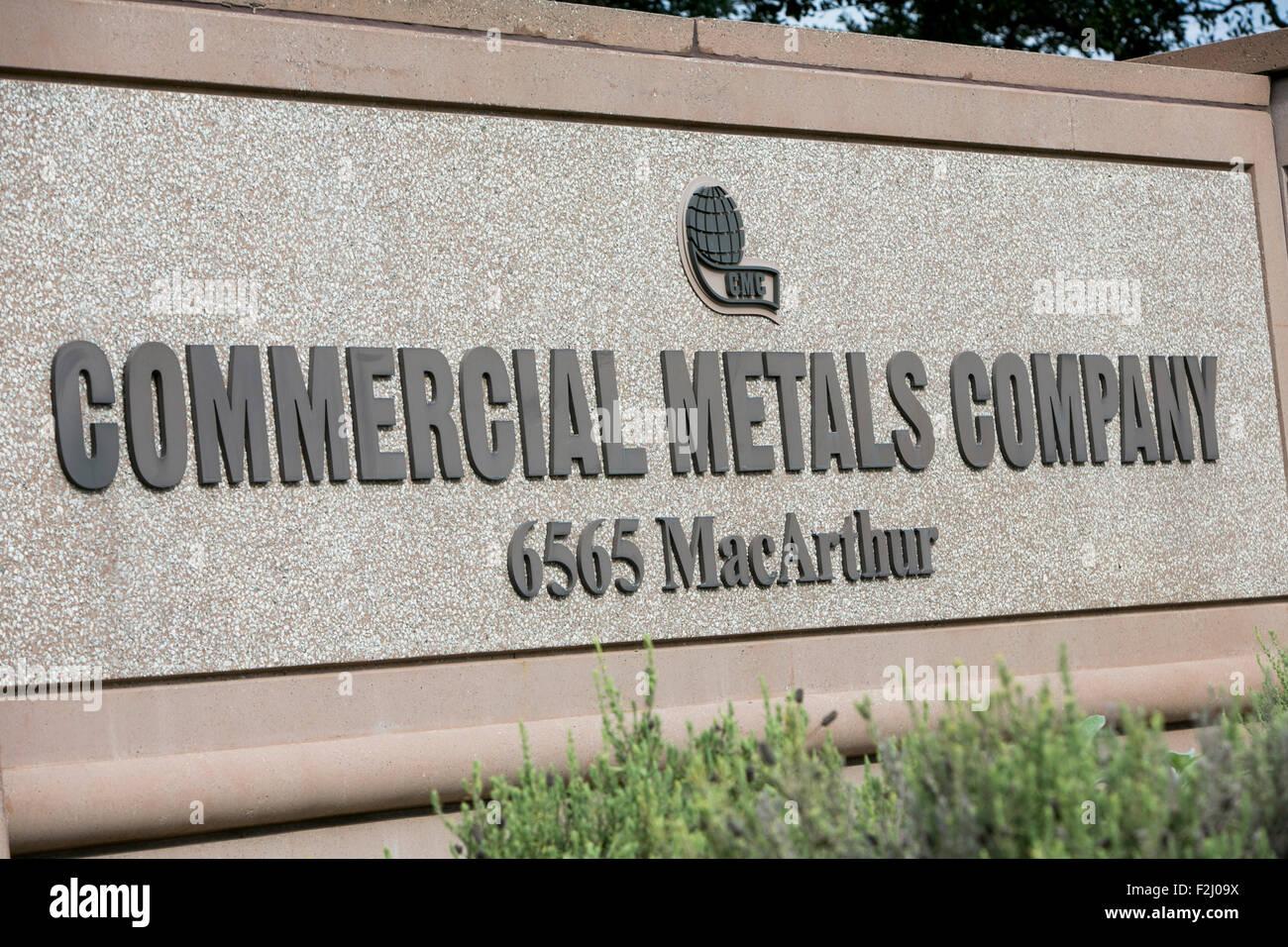 A logo sign outside of the headquarters of the Commercial Metals