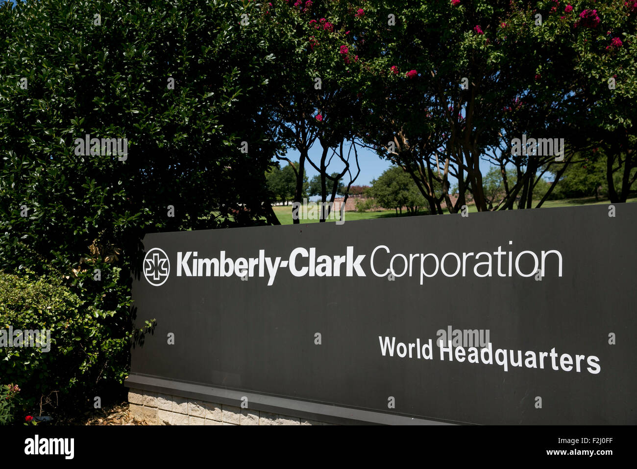 A logo sign outside of the headquarters of the Kimberly-Clark Corporation in Irving, Texas on September 13, 2015. Stock Photo