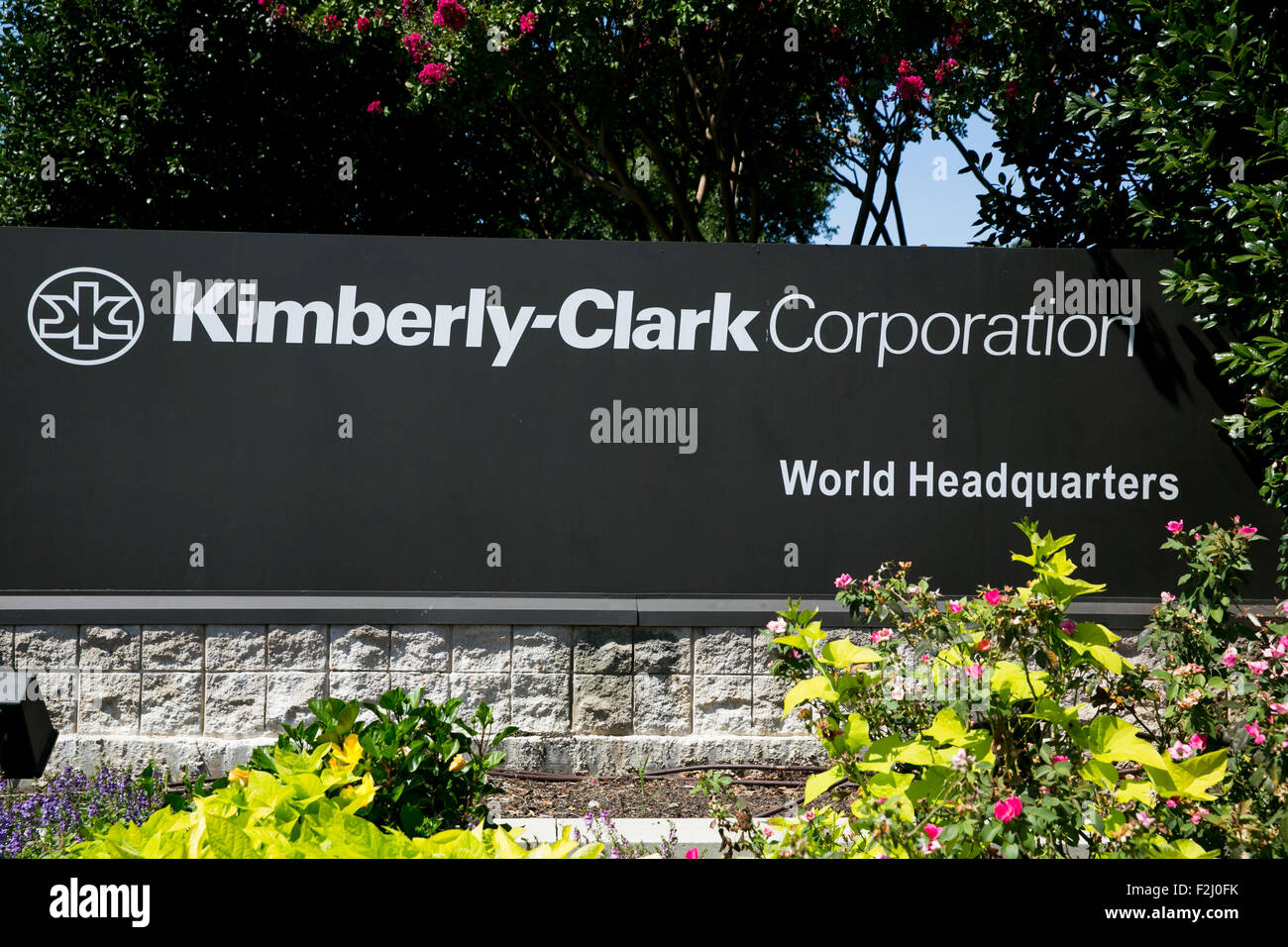 A logo sign outside of the headquarters of the Kimberly-Clark Corporation in Irving, Texas on September 13, 2015. Stock Photo
