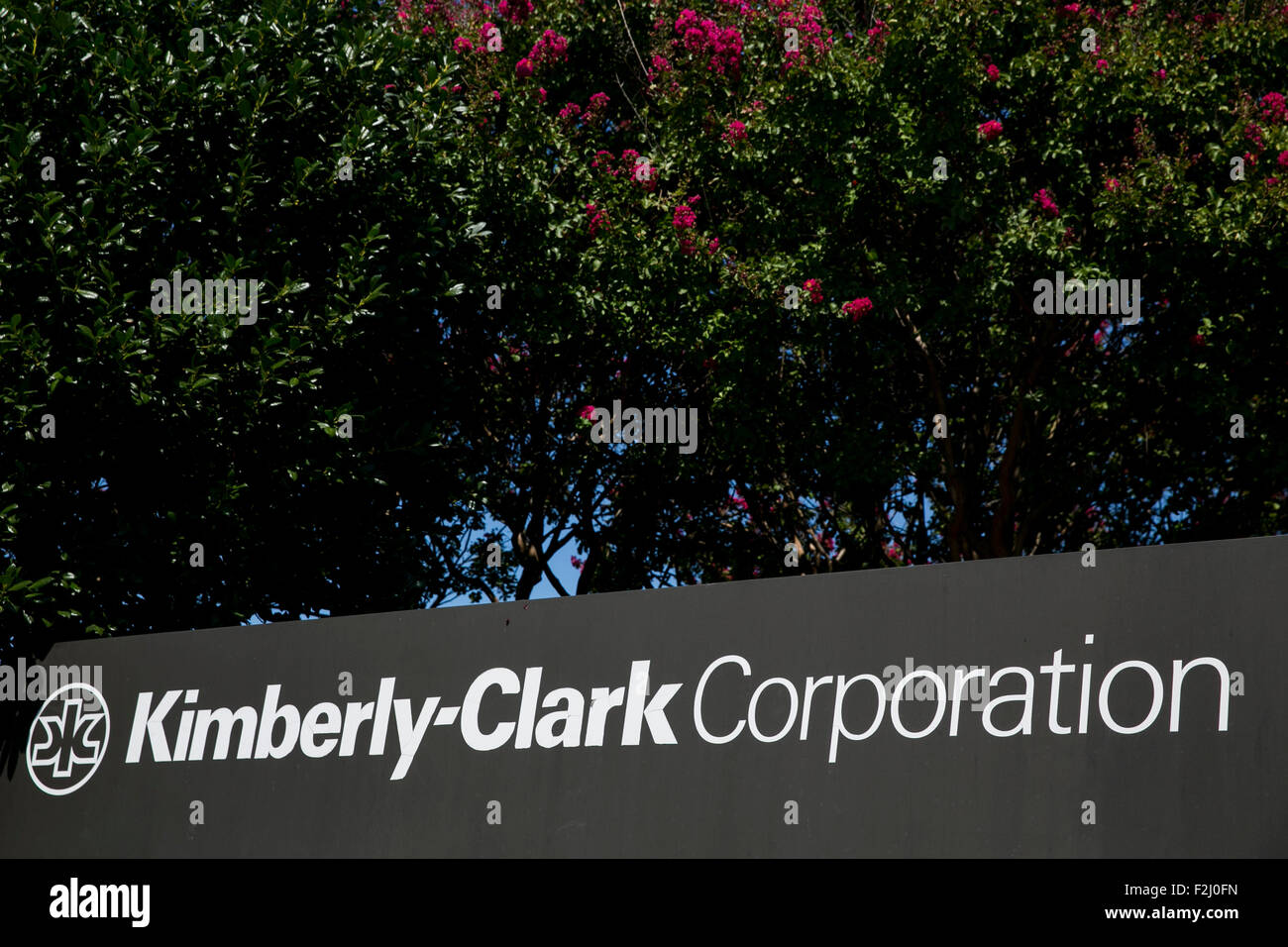 A logo sign outside of the headquarters of the Kimberly-Clark Corporation in Irving, Texas on September 13, 2015. Stock Photo