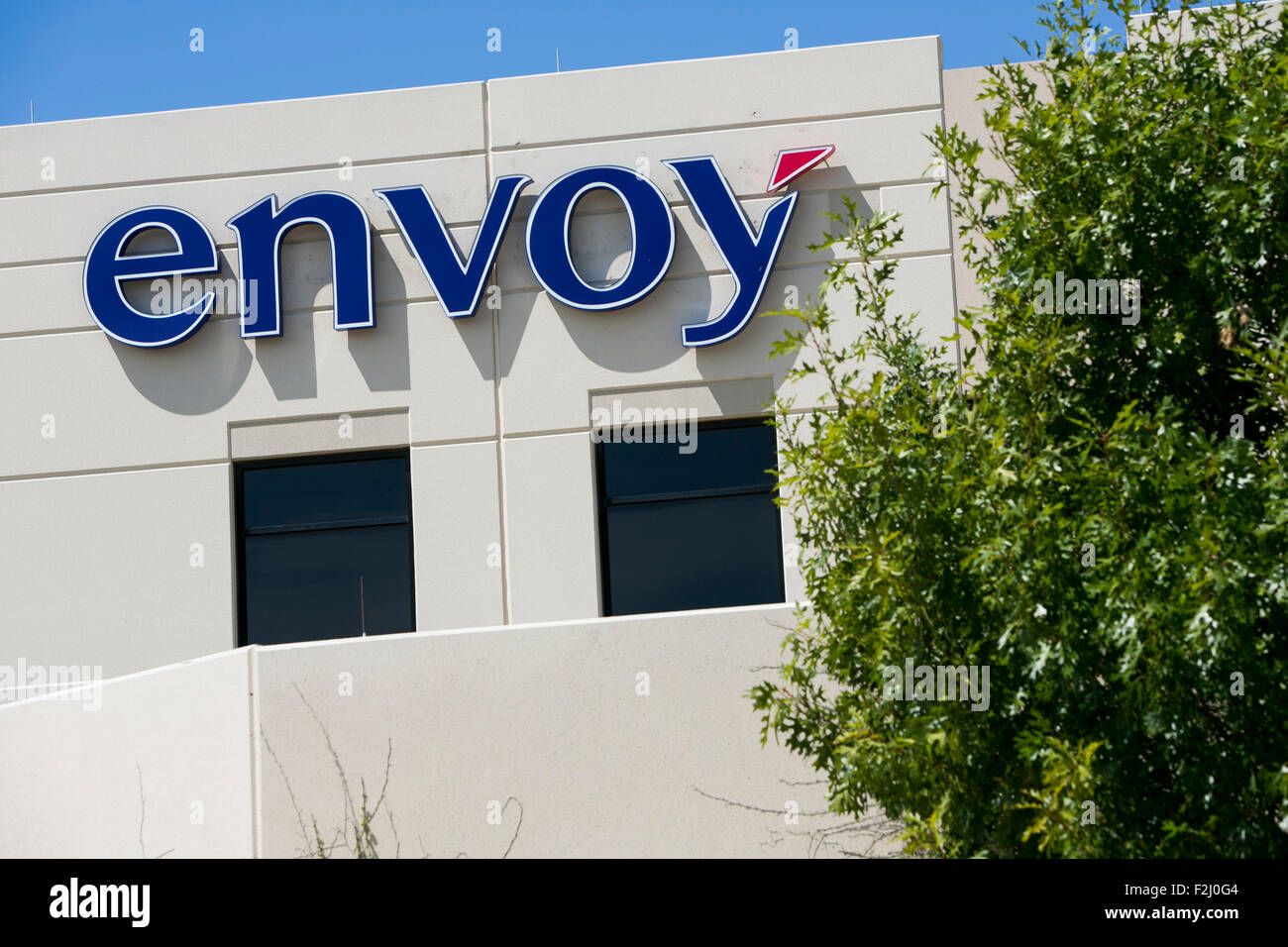 A logo sign outside of the headquarters of Envoy Air Inc., the parent
