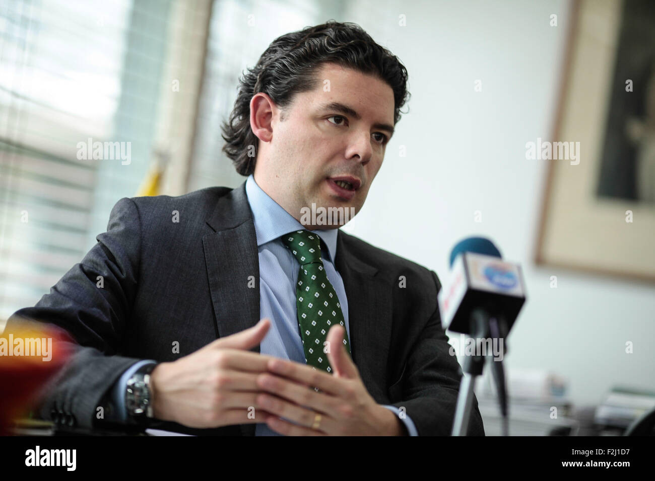 (150920) -- BOGOTA, Sept. 20, 2015 (Xinhua) -- Photo taken on Sept. 17, 2015 shows Colombian deputy Defense Minister for International Politics and Affairs Anibal Fernandez de Soto receiving an interview with Xinhua News Agency in Bogota city, capital of Colombia. Colombian Government began to take measures against the increase in several regions of the country of illegal mining, that is developed specially by the guerrillas and criminal bands that exploit the mineral resources of the country irregularly and are leaving severe damages to the environment. Anibal Fernandez de Soto explained that Stock Photo