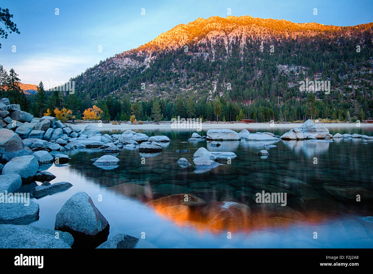 Rocks in a lake, Lake Tahoe, Sierra Nevada, California, USA Stock Photo