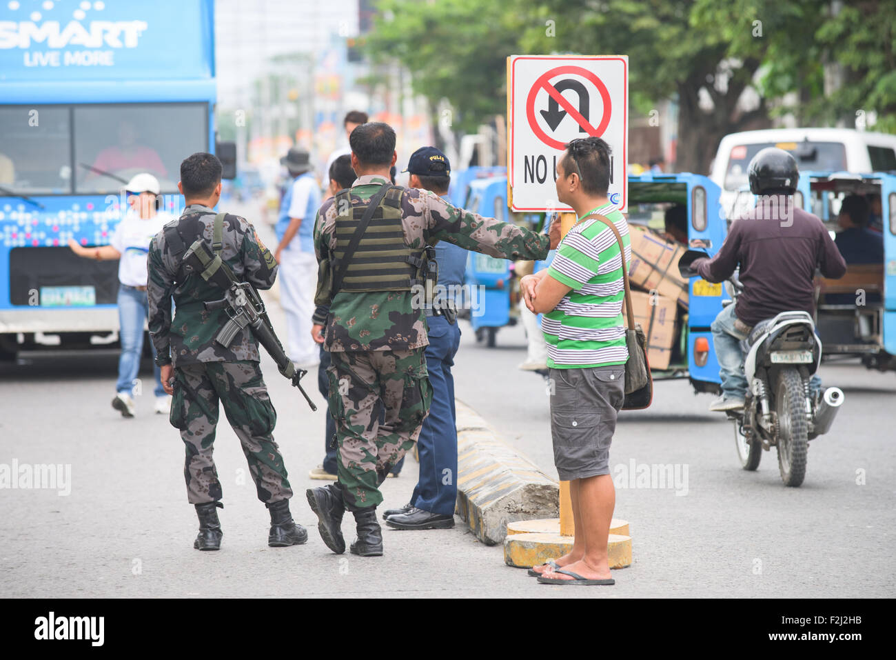 Armed police in General Santos City in The Philippines, due to the long ongoing conflicts and security issues on Mindanao Stock Photo