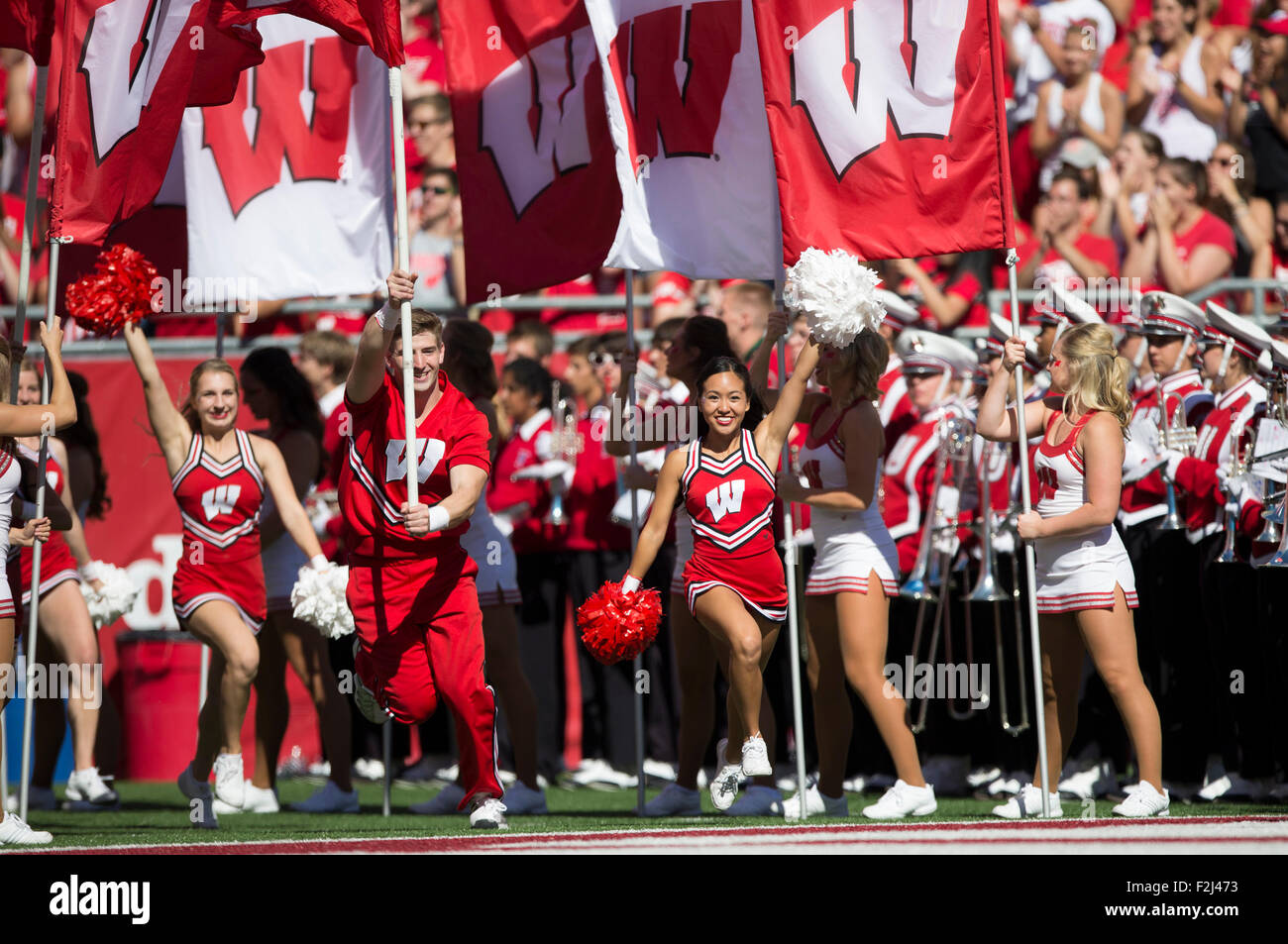 Madison, WI., USA. 19 September, 2015. Wisconsin cheerleader runs onto the field before the NCAA Football game between the Troy Trojans and the Wisconsin Badgers at Camp Randall Stadium in Madison, WI. Wisconsin defeated Troy 28-3. Credit:  Cal Sport Media/Alamy Live News Stock Photo