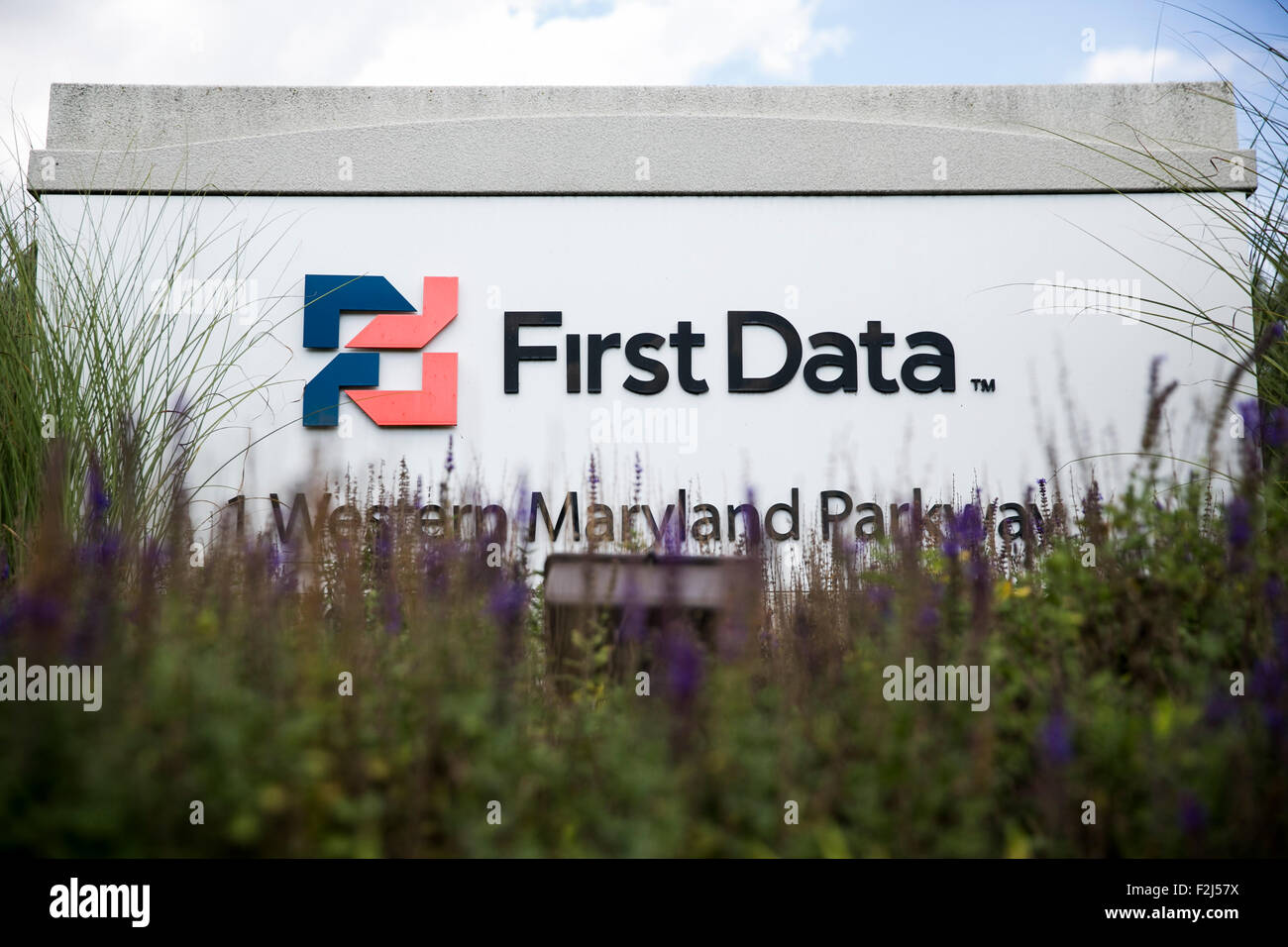A logo sign outside of a facility occupied by payments processor First Data Corporation in Hagerstown, Maryland on August 8, 201 Stock Photo