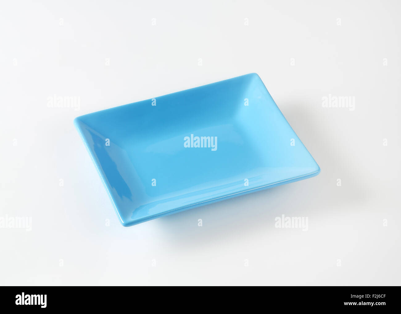 blue rectangular plate on white background Stock Photo Alamy