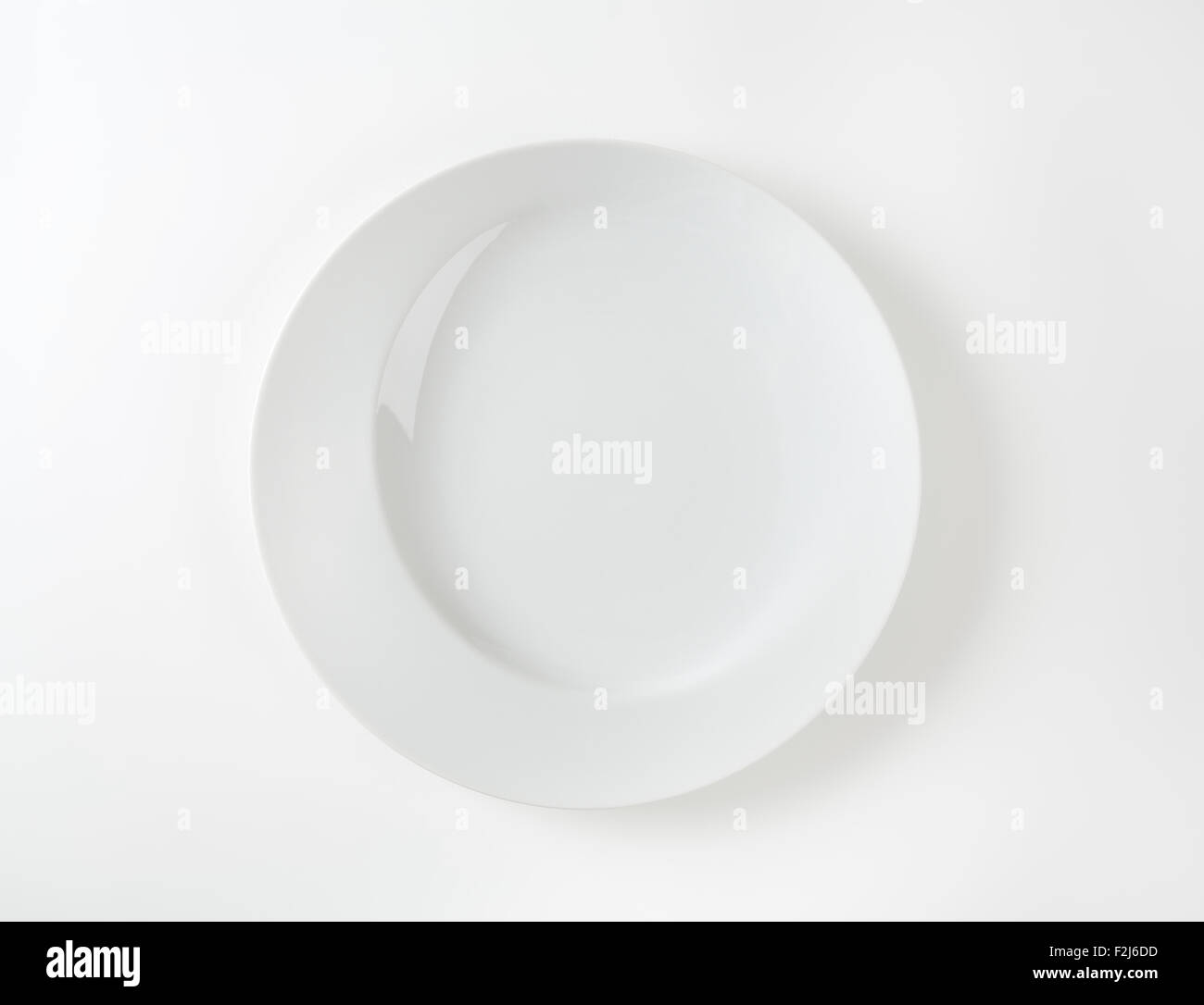 empty white plate on white background
