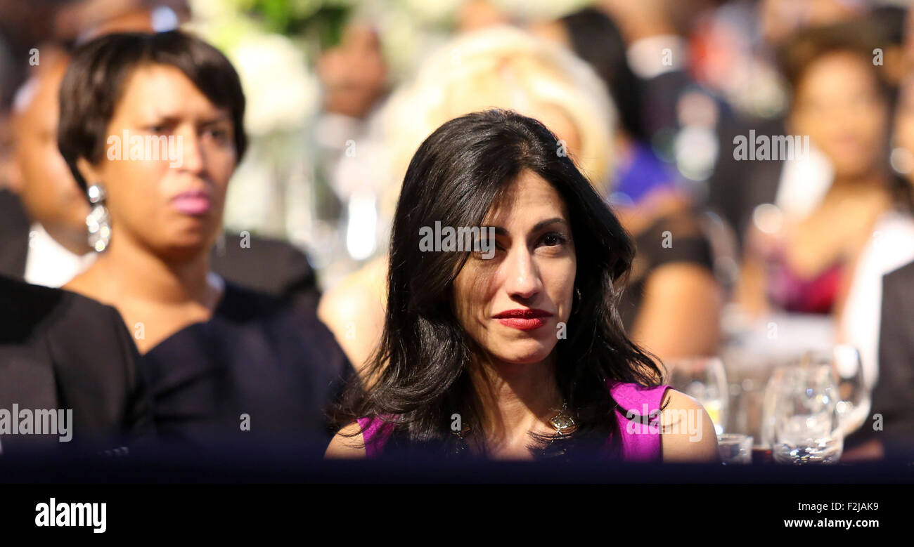 Washington, DC. 19th Sep, 2015. Huma Abedin, a longtime aide to Former United States Secretary of State Hillary Rodham Clinton, a candidate for the 2016 Democratic Party nomination for President of the United States, listens to a speaker at the Congressional Black Caucus Foundation's 45th Annual Phoenix Awards Gala at the Walter E. Washington Convention Center, September 19, 2015 in Washington, DC. US President Barack Obama is expected to deliver remarks. Credit: Aude Guerrucci/Pool via CNP - NO WIRE SERVICE - Credit:  dpa/Alamy Live News Stock Photo