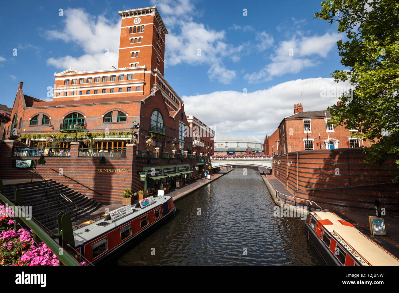 The bridge over the canal at Brindley Place looking towards the NIA in Birmingham, England Stock Photo