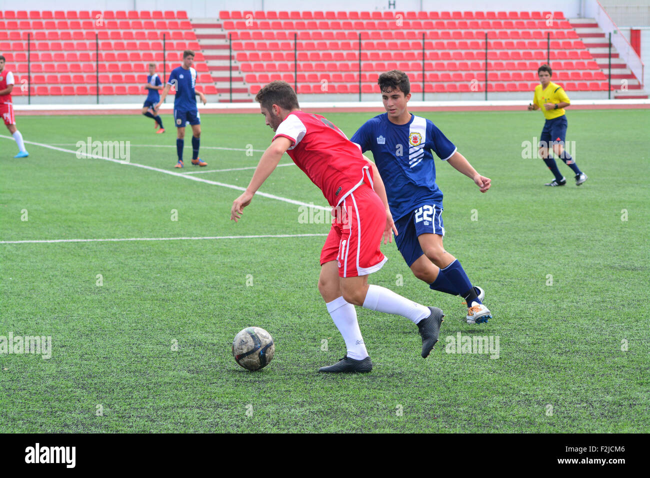 Gibraltar. 20th September, 2015. As part of the Gibraltar FA Grassroots day the National Squads for both the Under 19 and Under 17 faced off at the Victoria Stadium. In a tough fought, competitive match the Under 19s came out eventual winners by 3-0. The match was overseen by National senor squad manager Jeff Wood who from the sidelines tok a keen interest on the developing squads. Credit:  Stephen Ignacio/Alamy Live News Stock Photo