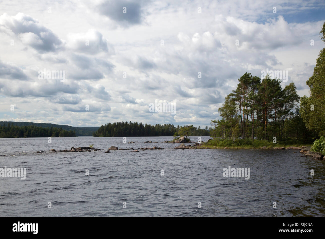 Swedish lake with rows of rocks, Glaskogen Nature Reserve, Varmland, Sweden Stock Photo