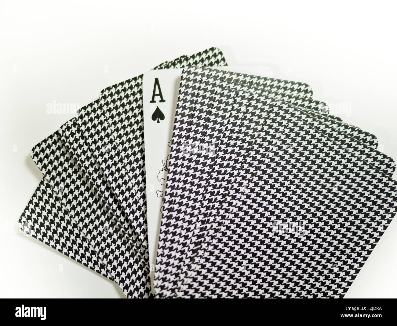 Back of the playing cards and ace of spade. Risky entertainment of gambling Stock Photo