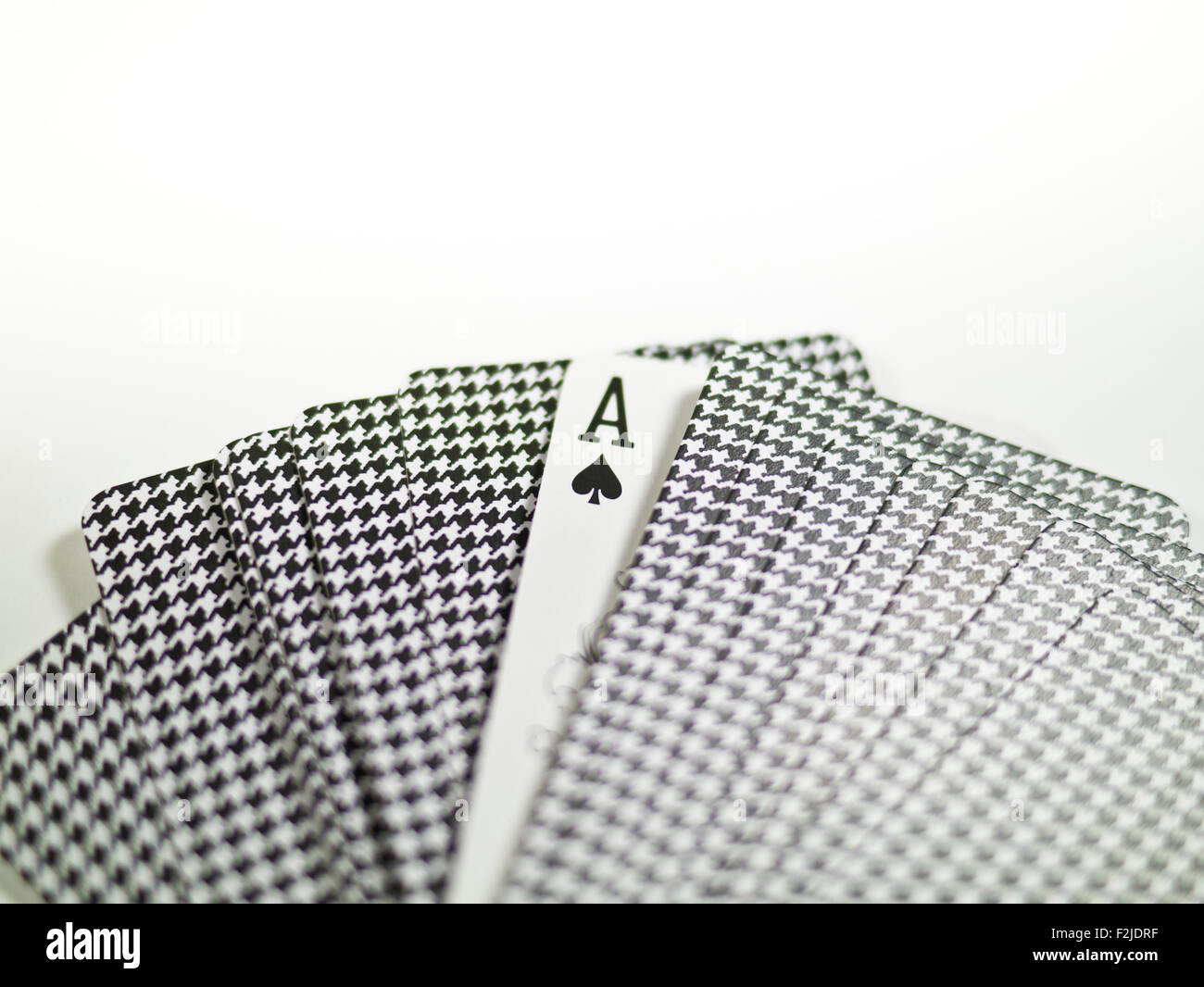 Back of the playing cards and ace of spade. Risky entertainment of gambling Stock Photo