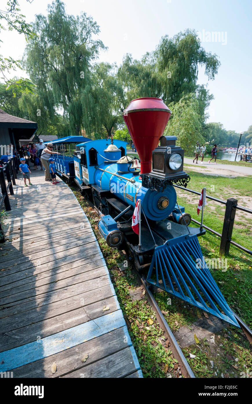 The well-known Centreville miniature train ride at Centreville amusement park on the Toronto Islands. Toronto Ontario Canada Stock Photo