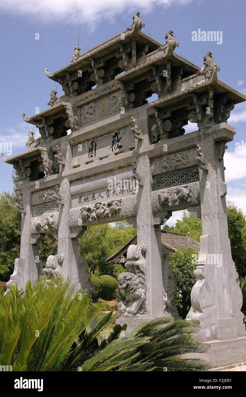 Kunming, China:  Ceremonial Gate with carved figures and dragons at the Hui Garden from Anhui Province at the World Horti-Expo Stock Photo