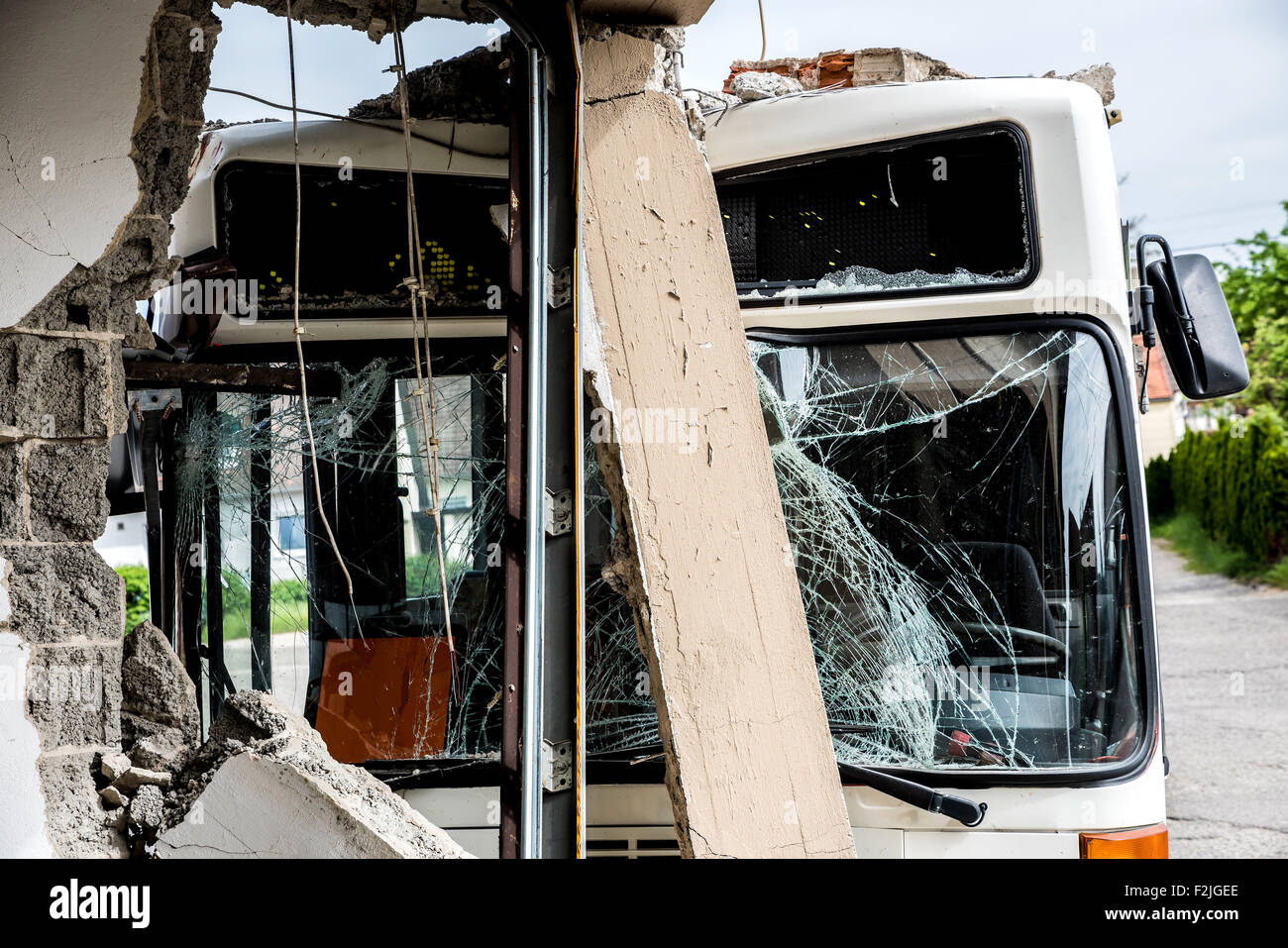 Bus crashed into a wall Stock Photo