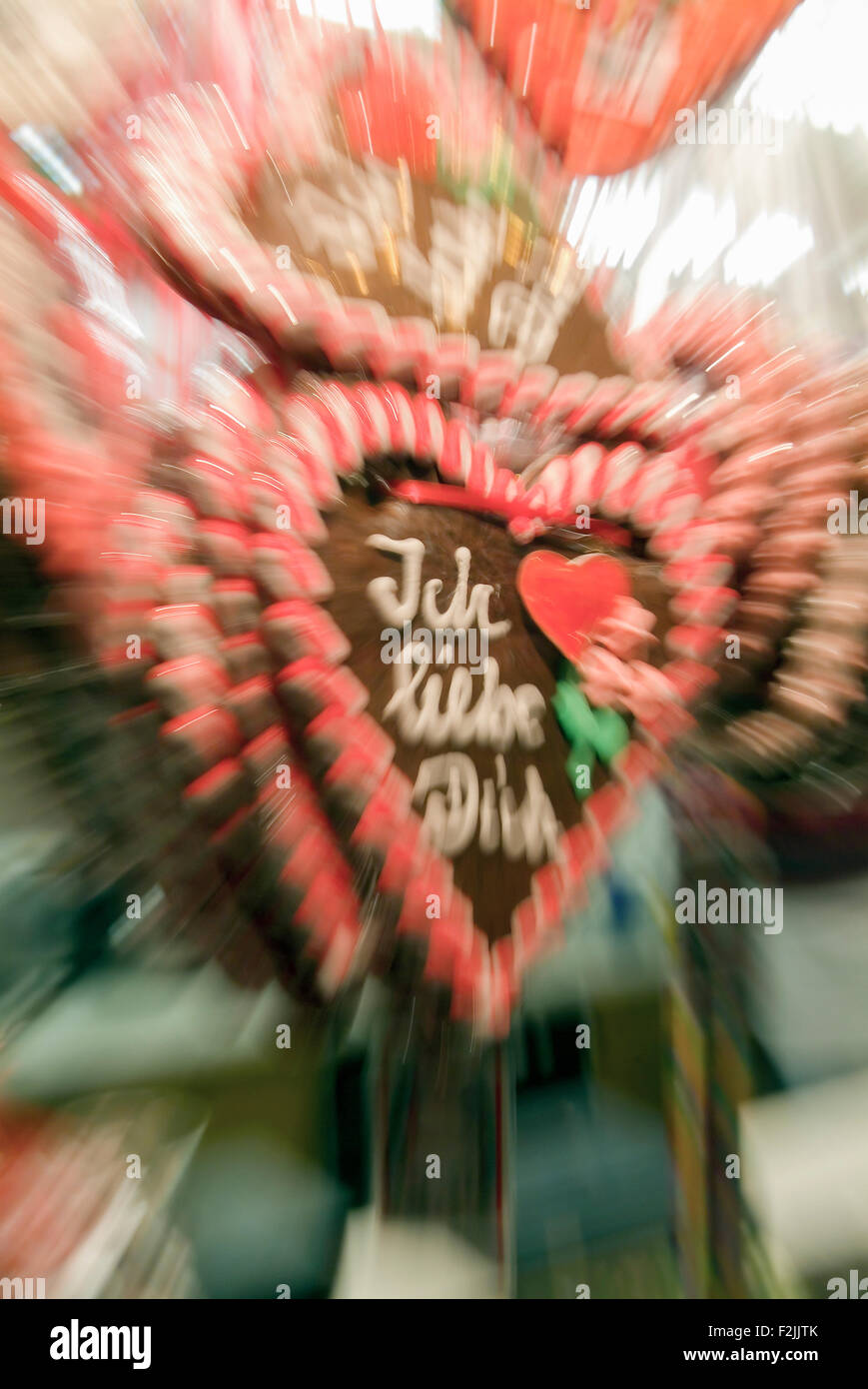 'Ich liebe dich' means I love you on a gingerbread heart on a christmas market, zoomed and blurred, in Germany Europe Stock Photo
