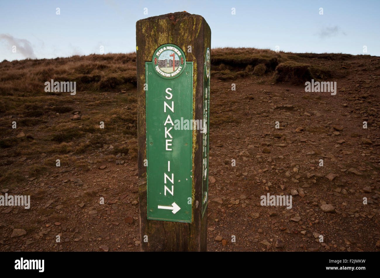 Sign post directing walkers towards the Snake Inn from Kinder Scout in the Peak District National Park. Stock Photo