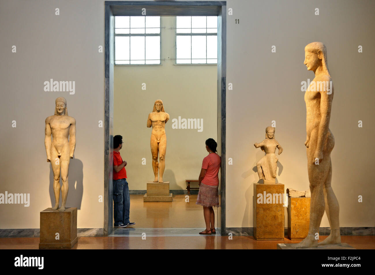 Kouros statues in the National Archaeological Museum of Athens, Greece. Stock Photo
