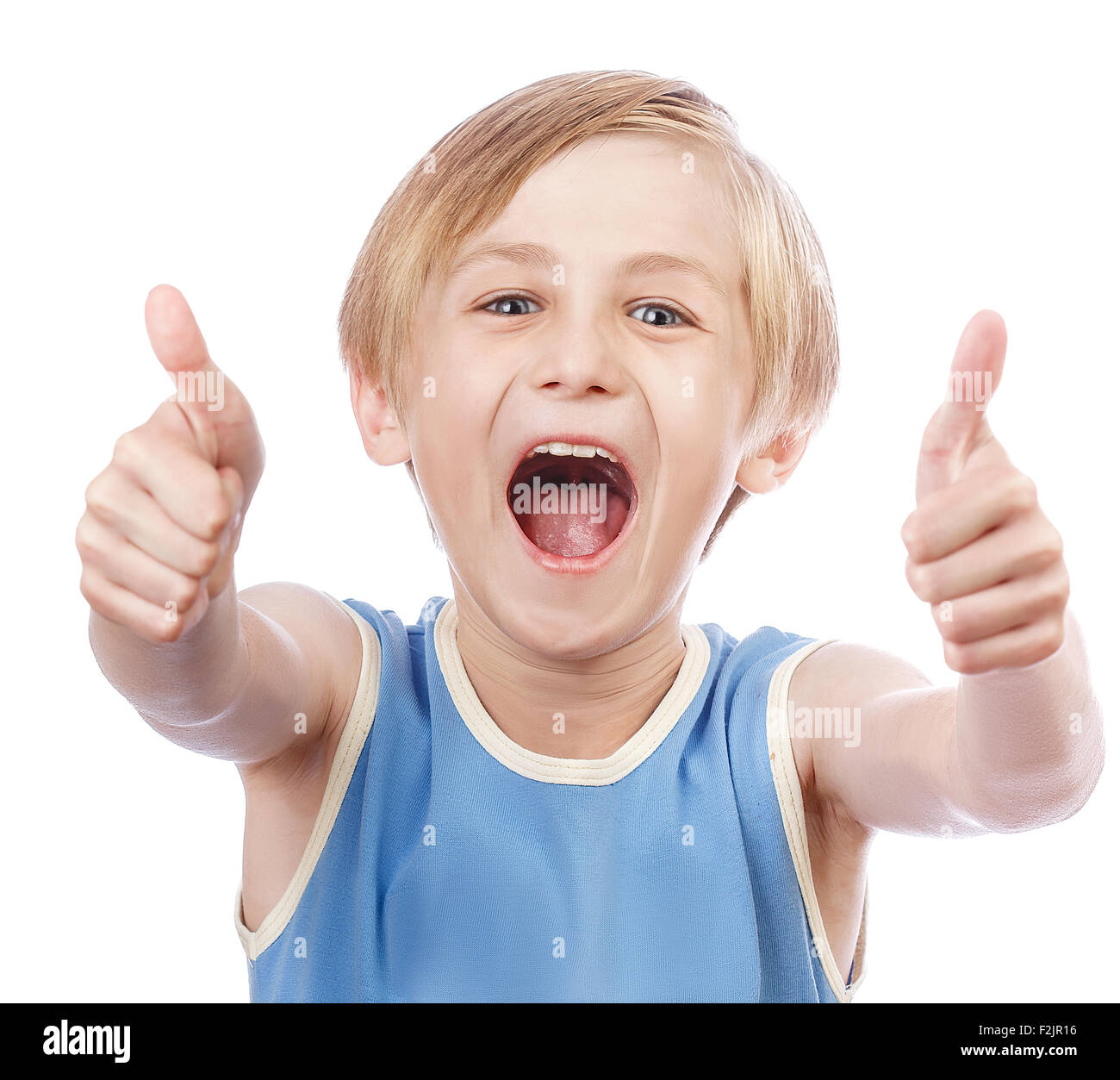 Smiling young little boy giving thumb up gesture, isolated Stock Photo ...