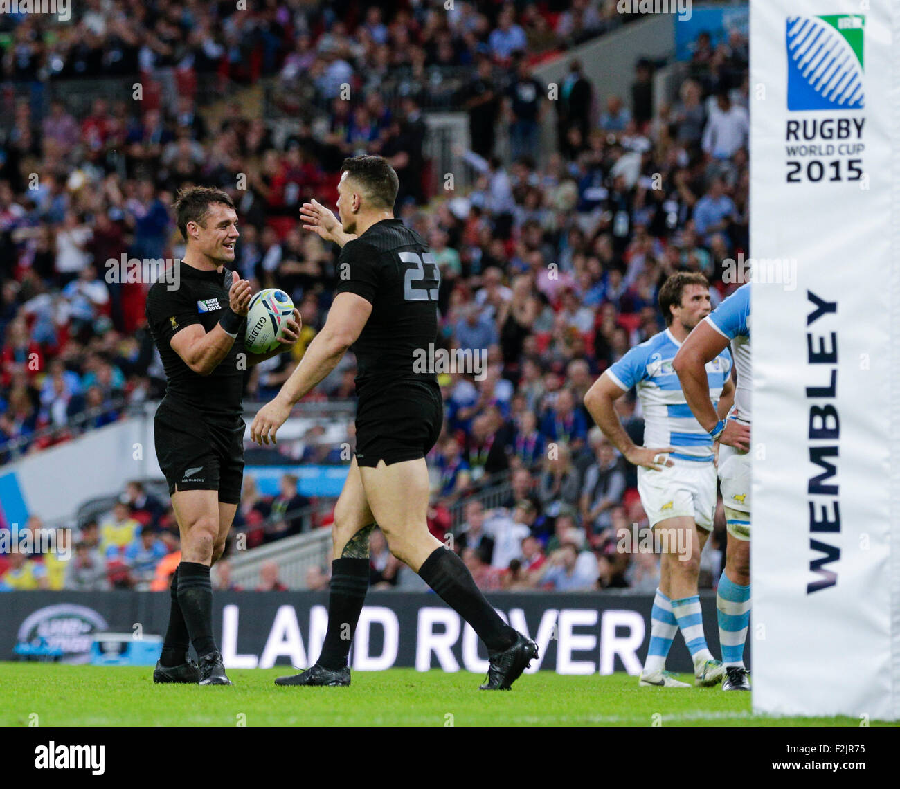 London, UK. 20th Sep, 2015. Rugby World Cup. New Zealand versus Argentina. New Zealand outhalf Dan Carter and New Zealand replacement back Sonny Bill Williams celebrate Sam Cane's (not pictured) try Credit:  Action Plus Sports/Alamy Live News Stock Photo