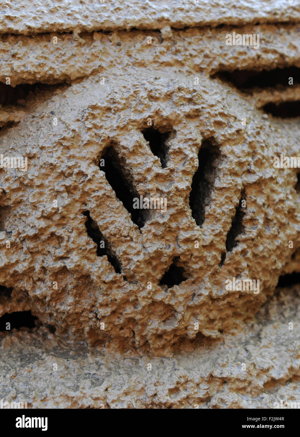 Kassel, Germany. 15th Dec, 2011. The emblem of a VW Tiguan is almost completely covered in mud at a construction site in Calden near Kassel, Germany, 15 December 2011. Weather in the coming days wil be dominated by rains and storms. Photo: Uwe Zucchi/dpa/Alamy Live News Stock Photo