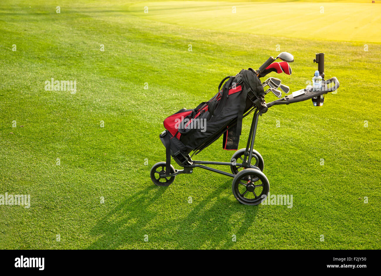 Professional golf clubs in a baggage at sunset Stock Photo Alamy