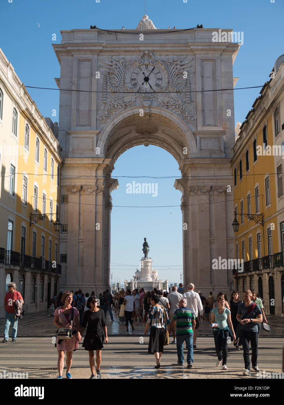 Tourists taking pictures of the Rua Augusta Arch in downtown Lisbon Stock Photo