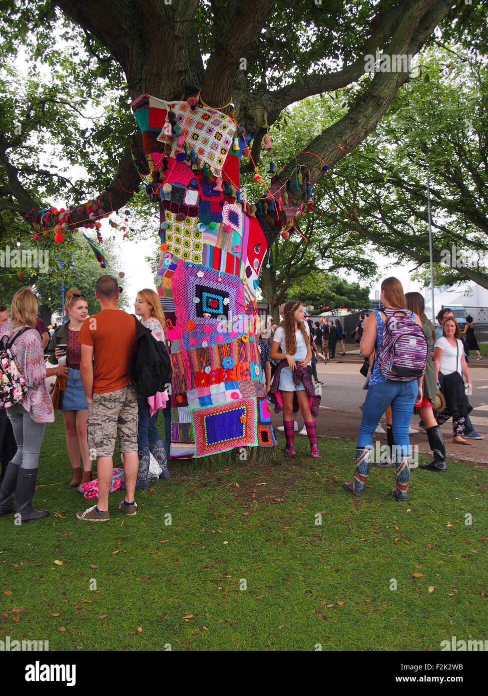 A tree that has been covered in knitted decoration in a display of yarn bombing Stock Photo