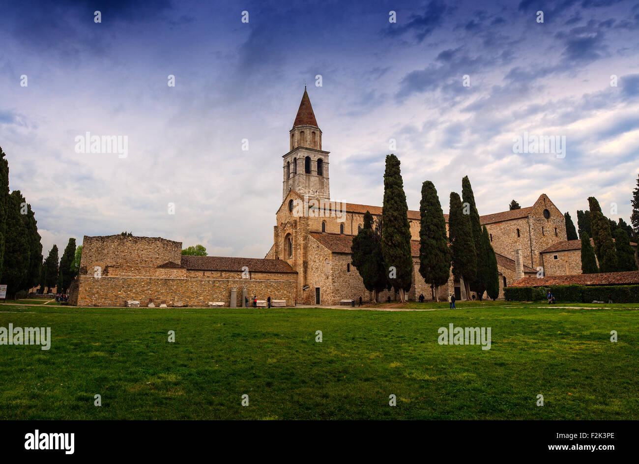 View of Basilica di Santa Maria Assunta and bell tower of Aquileia, Italy. Aquileia is UNESCO World Heritage Site Stock Photo