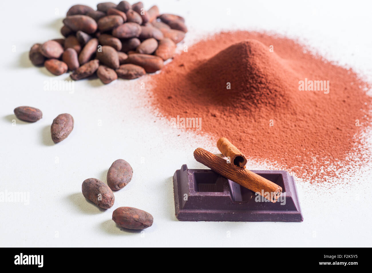 Close up of chocolate bar, cacao and cinnamon Stock Photo