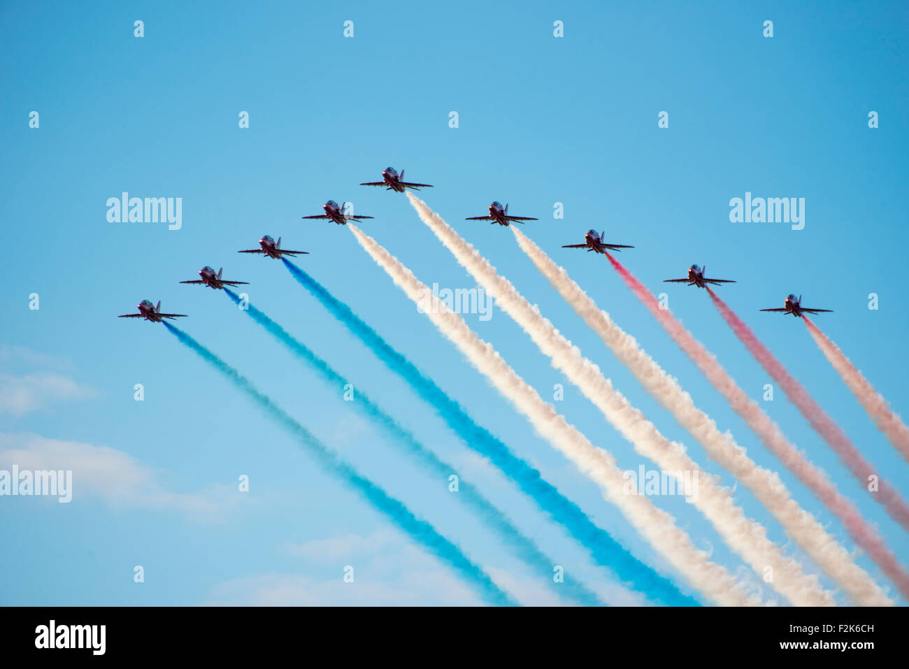 Duxford, UK. 20th Sep, 2015. Red arrows and Spitfires at the Duxford Battle of Britain airshow, Sunday 20th Sept - Stock Image