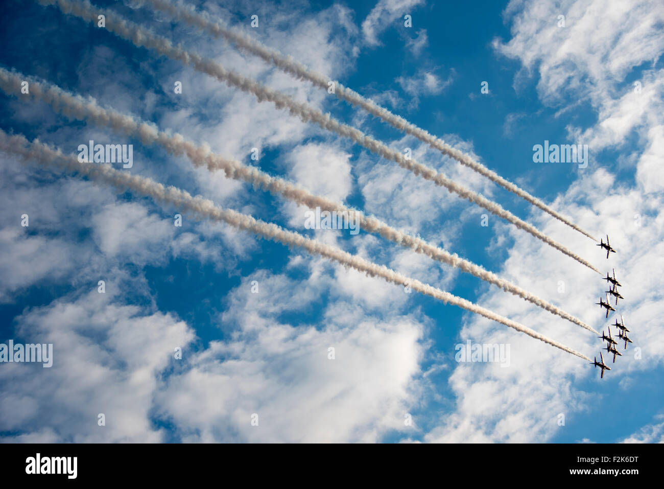 Duxford, UK. 20th Sep, 2015. Red arrows and Spitfires at the Duxford Battle of Britain airshow, Sunday 20th Sept - Stock Image