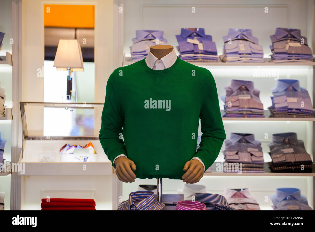 View of green sweater in the clothes shop Stock Photo