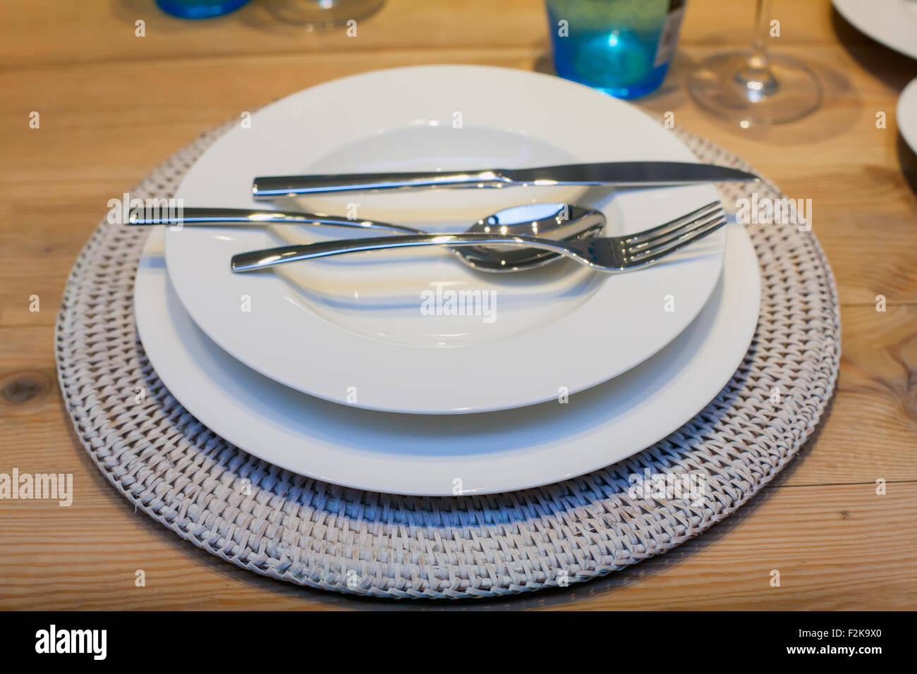 Close up of dishware on wooden table Stock Photo