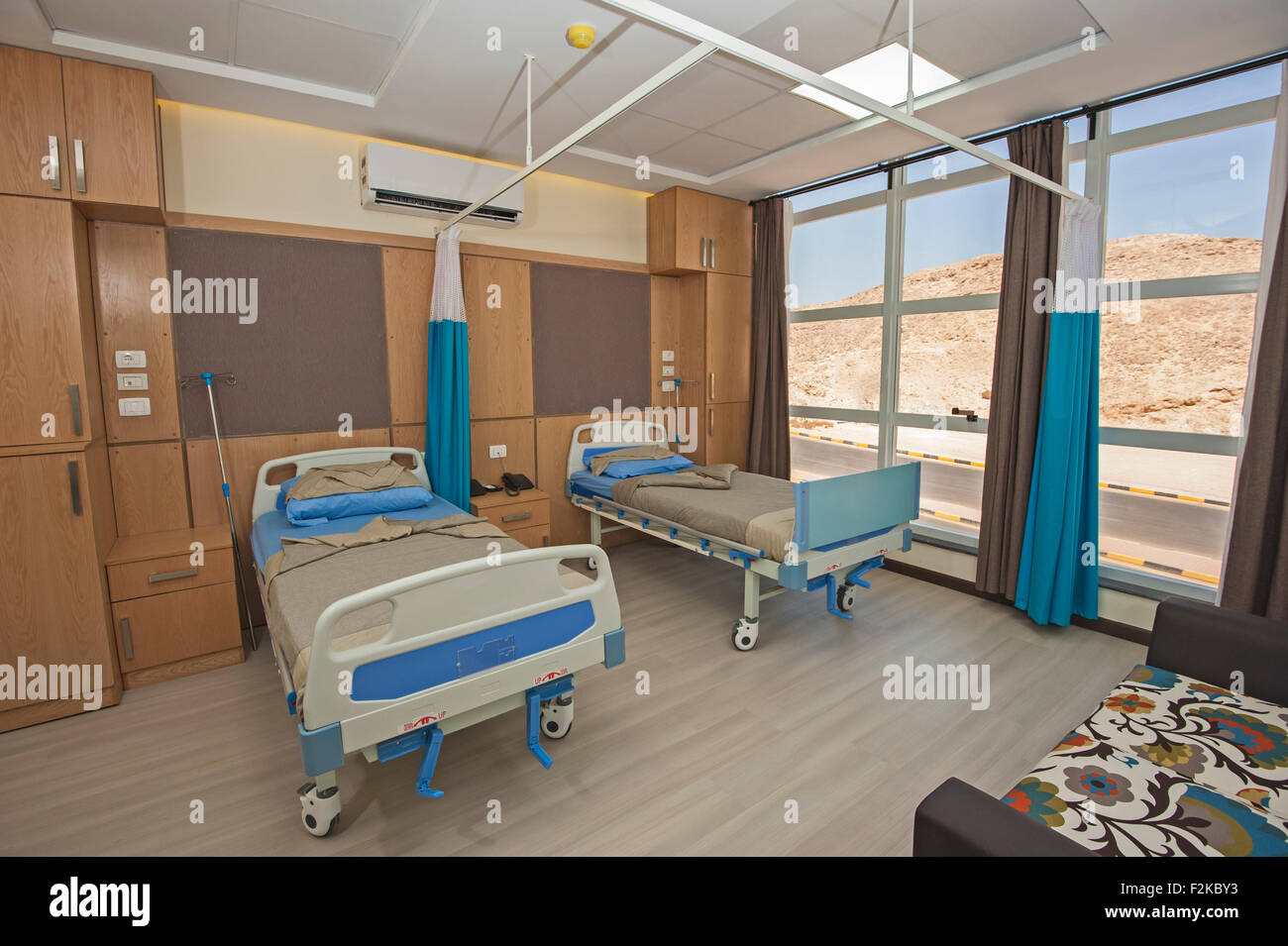 Hospital beds in a private hospital ward with sofa Stock Photo Alamy