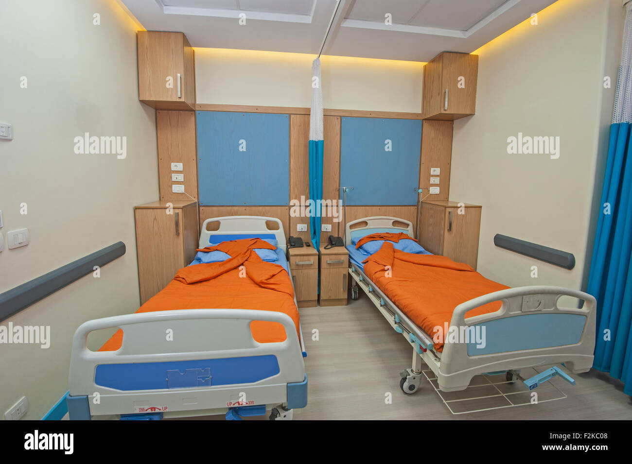 Hospital beds in a private hospital ward Stock Photo