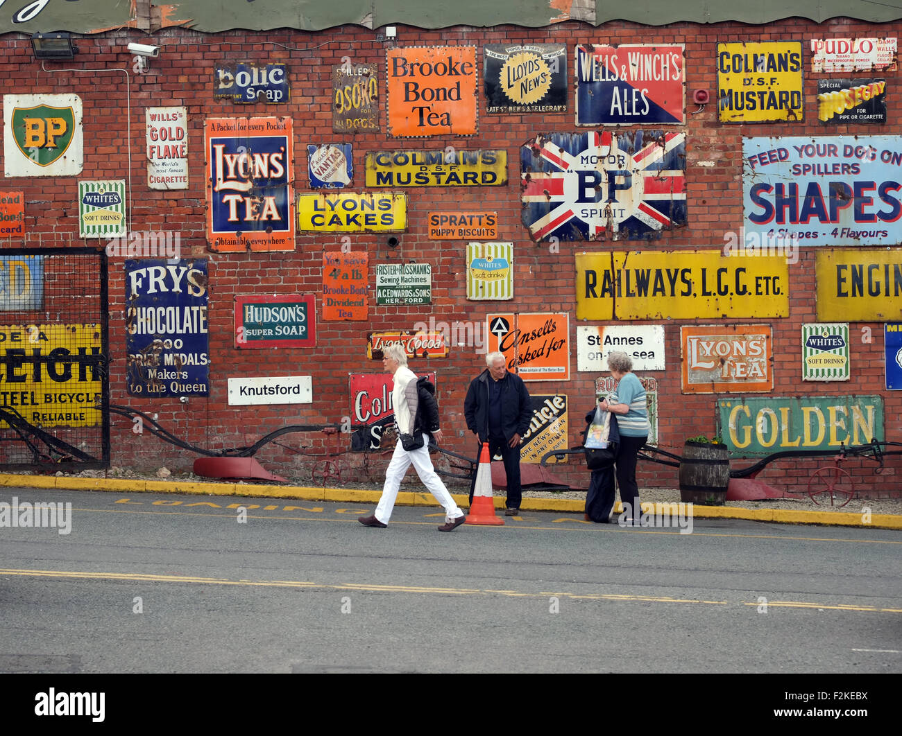 Vintage enamel advertising signs at Bygone Times antiques centre, Eccleston, Chorley, , Lancashire, England UK Stock Photo