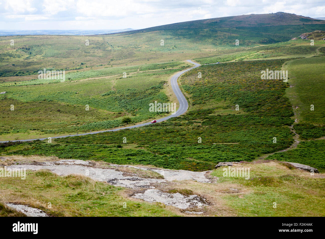 Car driving moorland road near Haytor, Dartmoor national park, Devon, England, UK Stock Photo