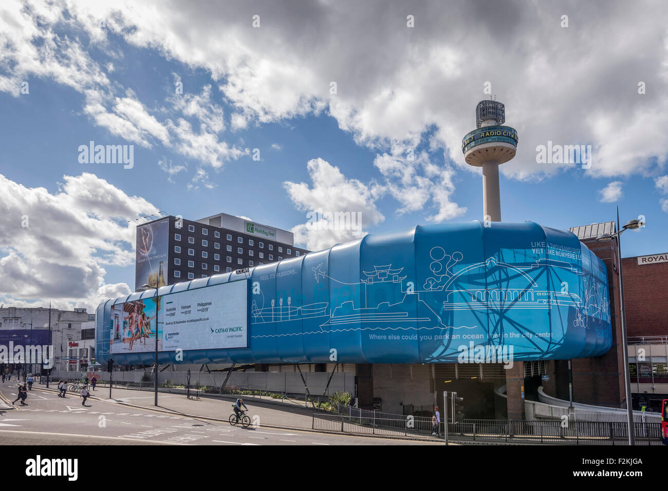 St Johns precinct and shopping centre with the massive television screen and the Beacon. Tower Stock Photo