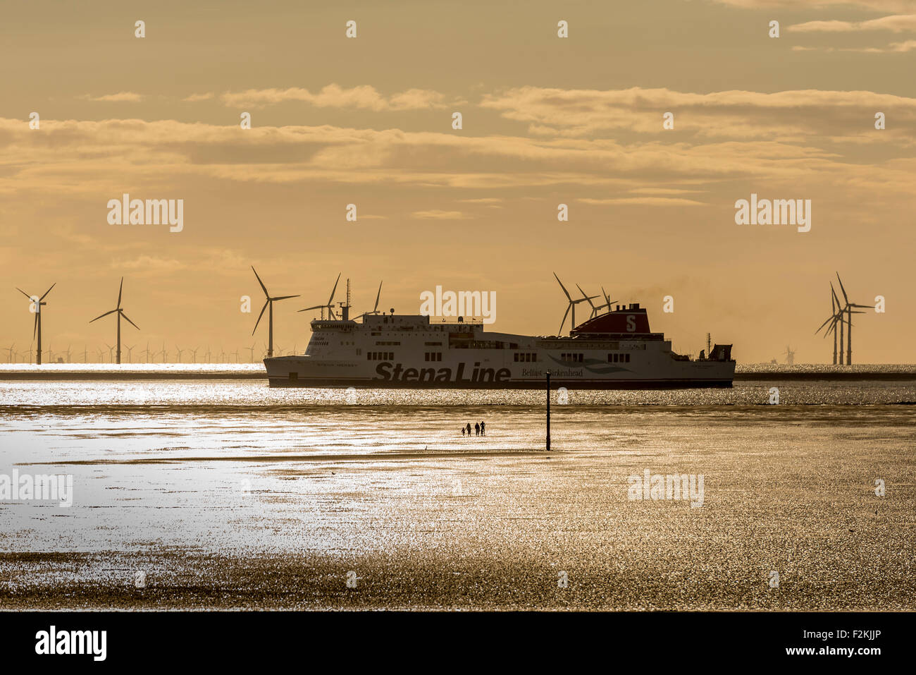 Sunset. Crosby beach River Mersey Merseyside North West England.  Ro Ro ferry Stena Mersey Stock Photo