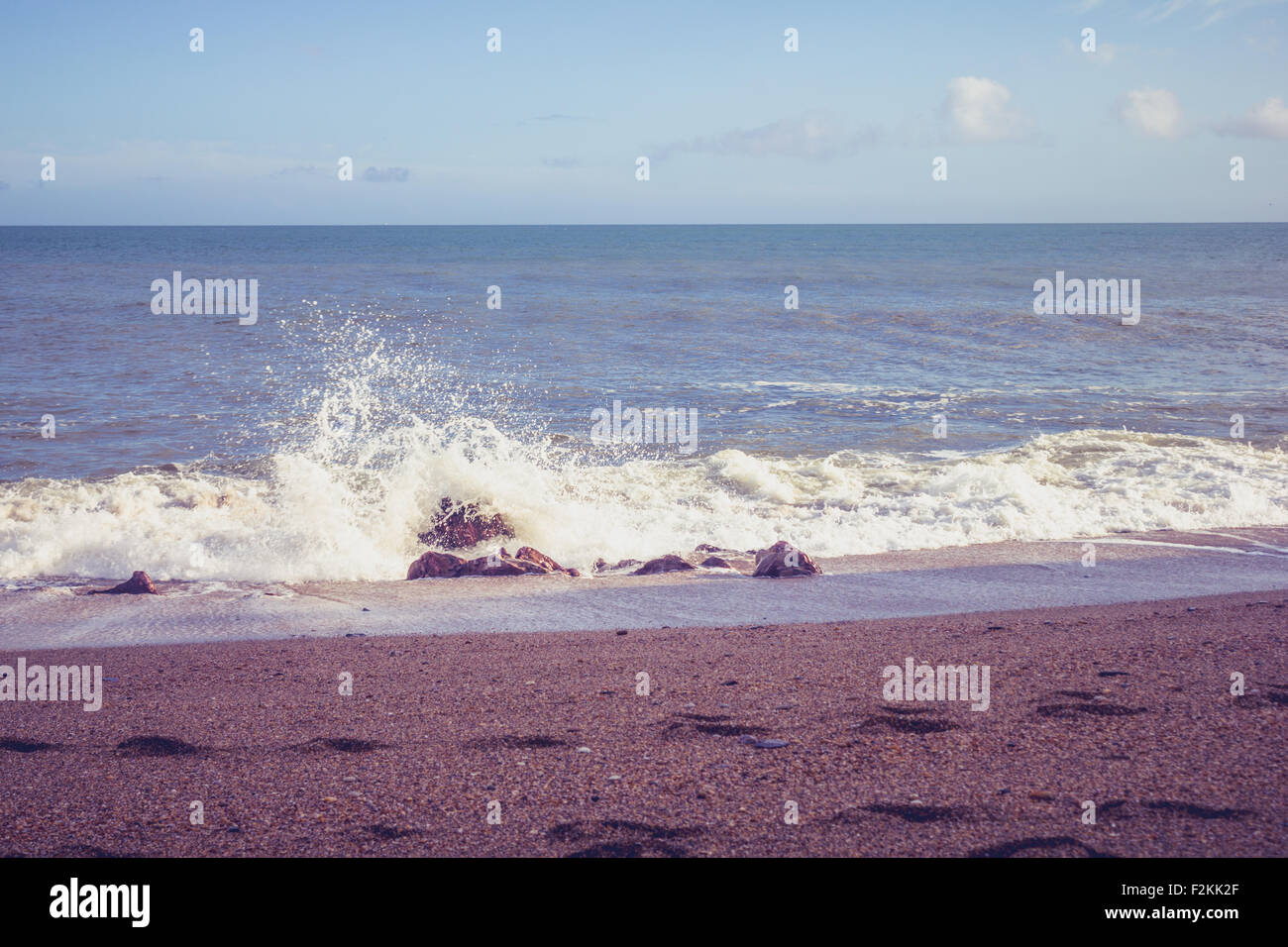 Small waves crash on shore hi-res stock photography and images - Alamy