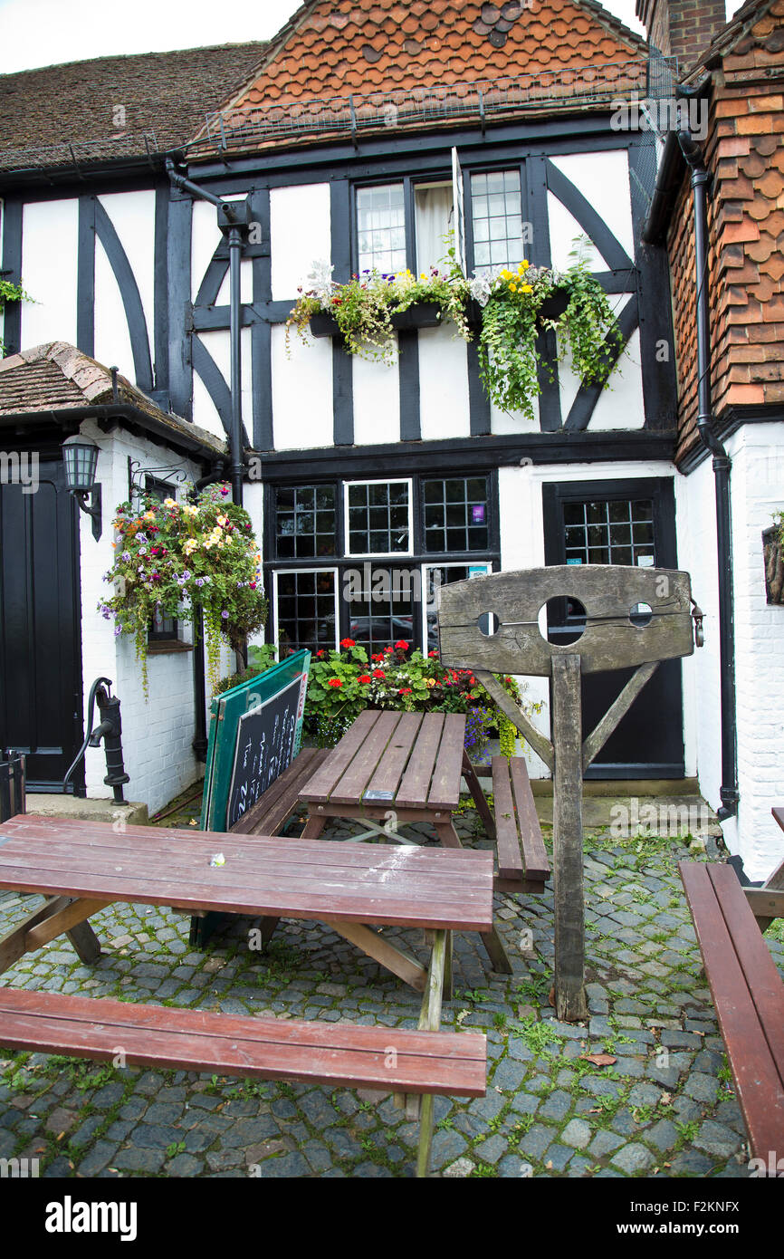 Traditional stocks in the medieval village of Shere near Guldford Surrey Stock Photo