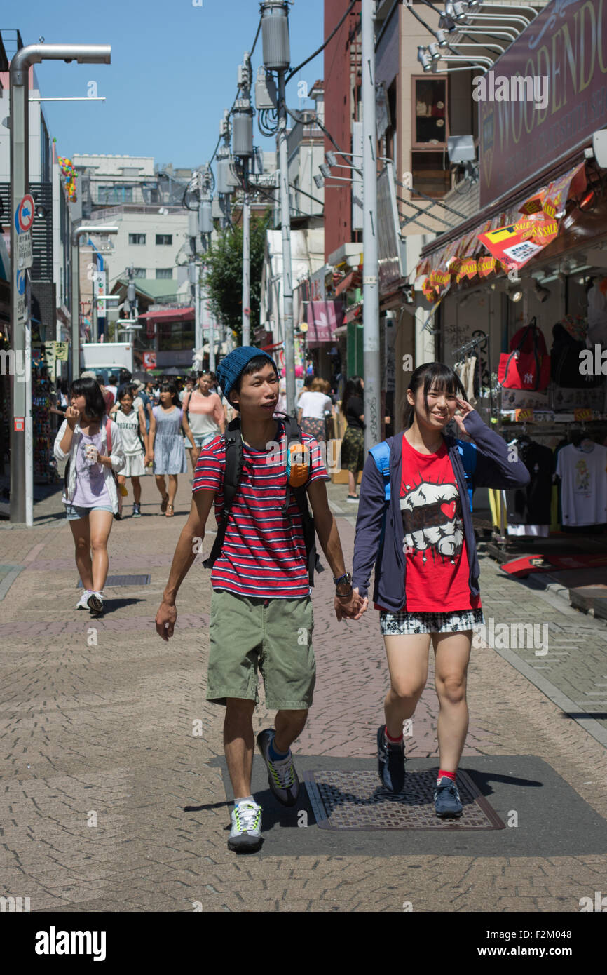 Walking couple. Harajuku, Tokyo. Stock Photo