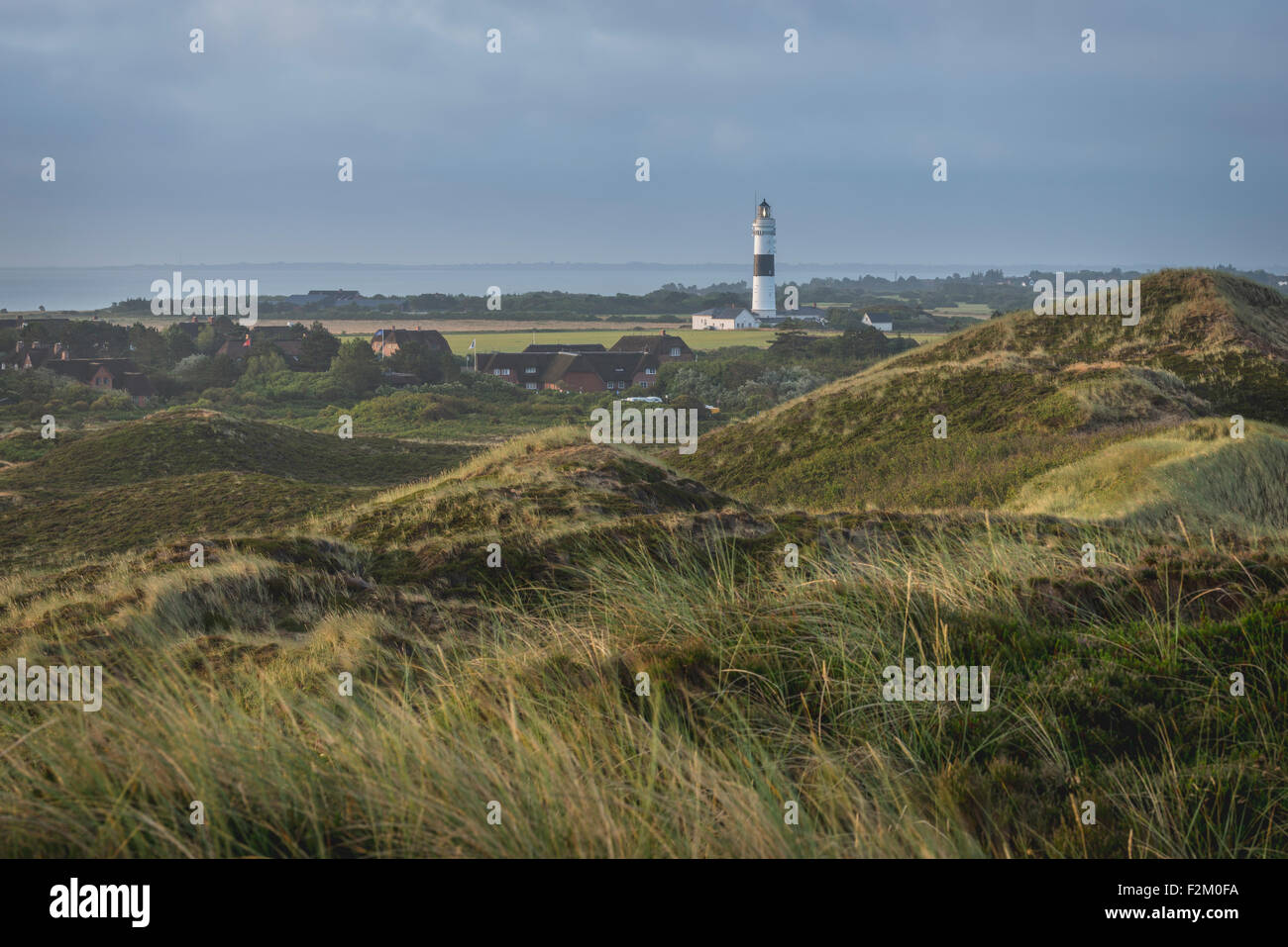 Germany, Sylt, Kampen, view to light house 'Rotes Kliff' with dune in the foreground Stock Photo