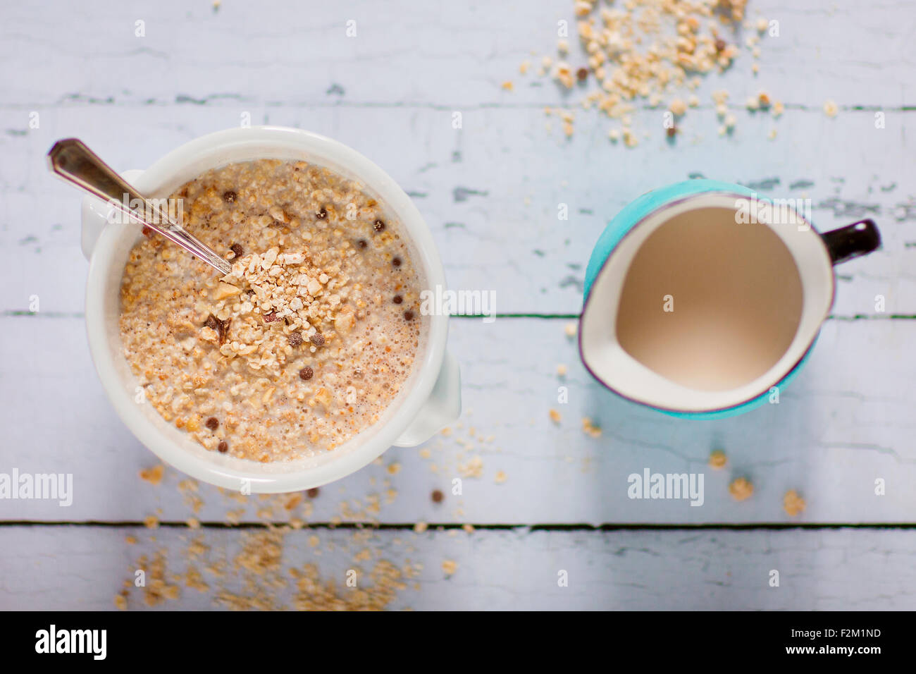 Quinoa breakfast cereals bowl and milk jug Stock Photo Alamy