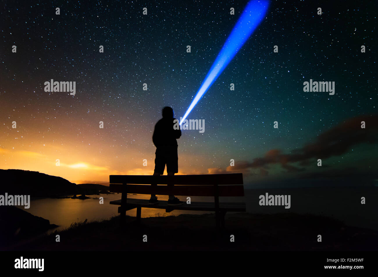 Man shining torch hi-res stock photography and images - Alamy