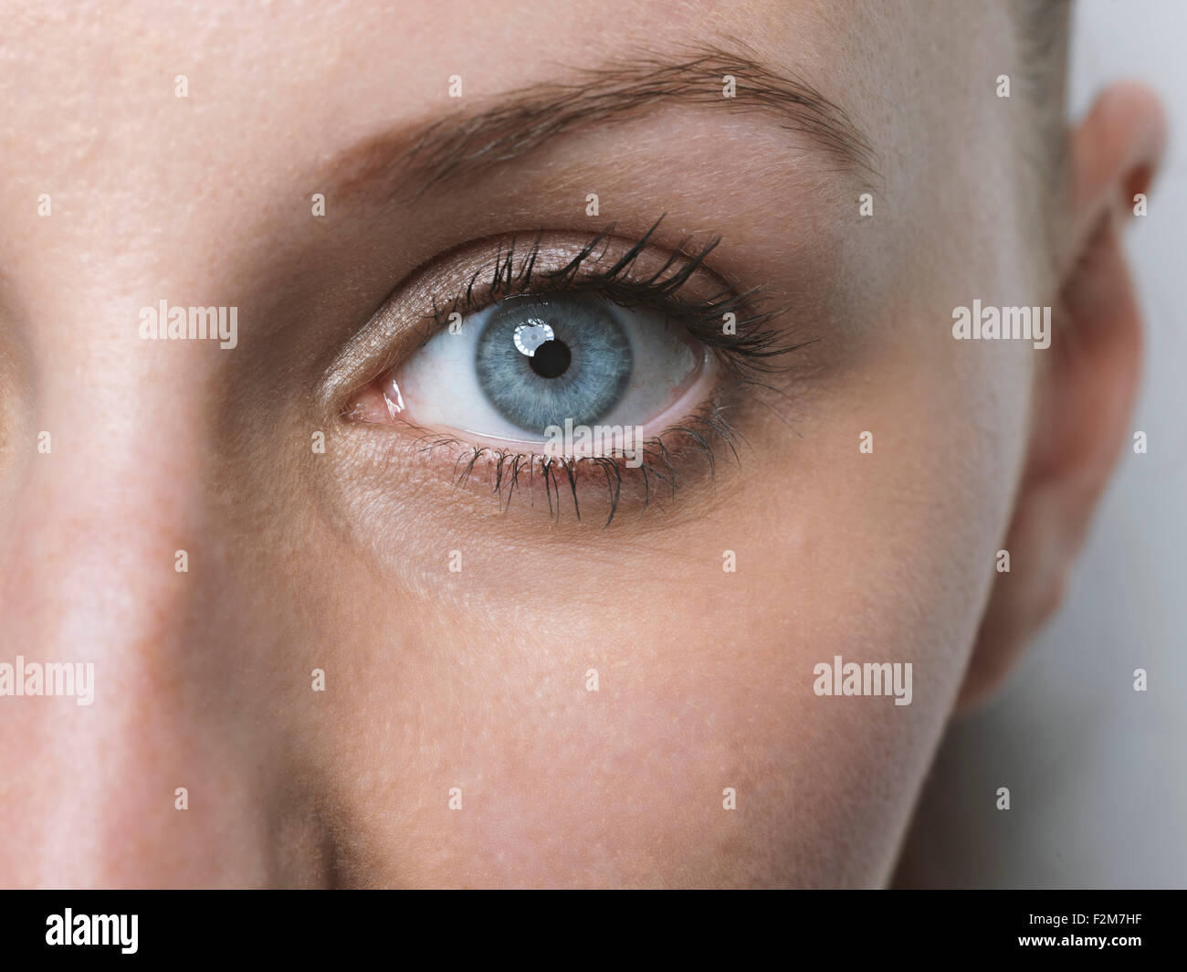 Close-up of blue eye of a  young woman Stock Photo