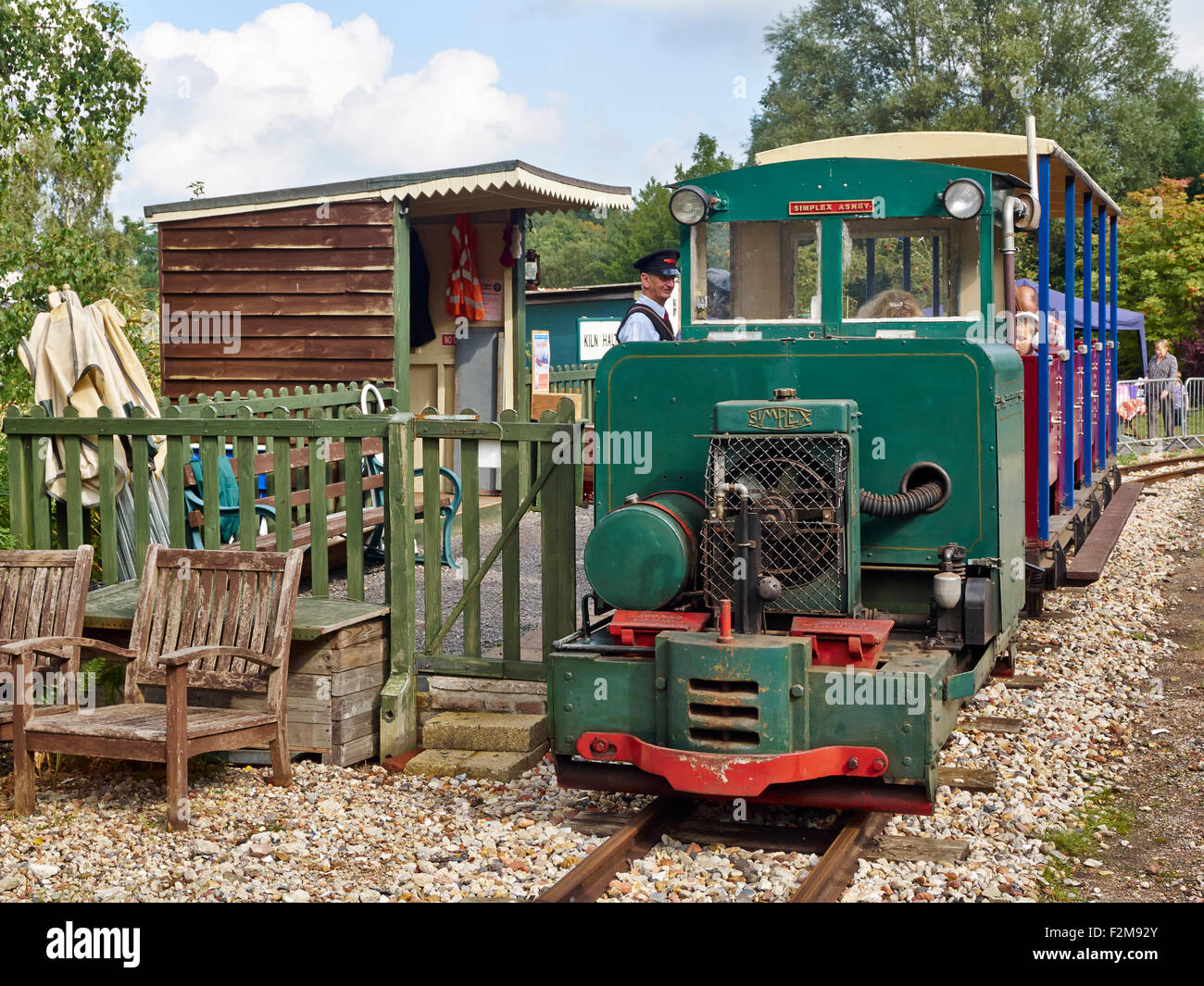Narrow gauge railway, Bursledon Brickworks Industrial Museum, Hampshire with a Simplex petrol loco hauling a passenger train. Stock Photo